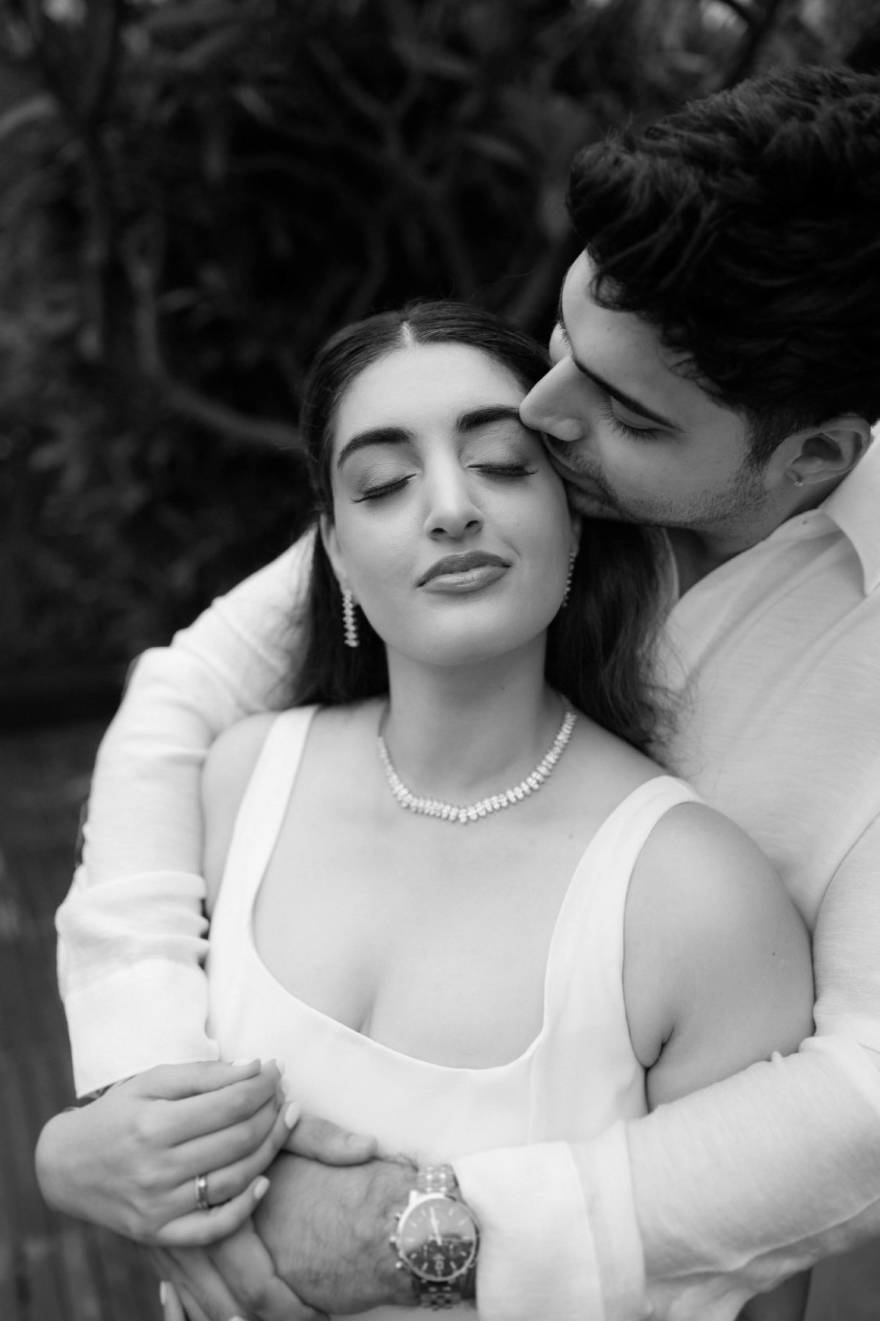 Happy couple photographed by WeddingClickz