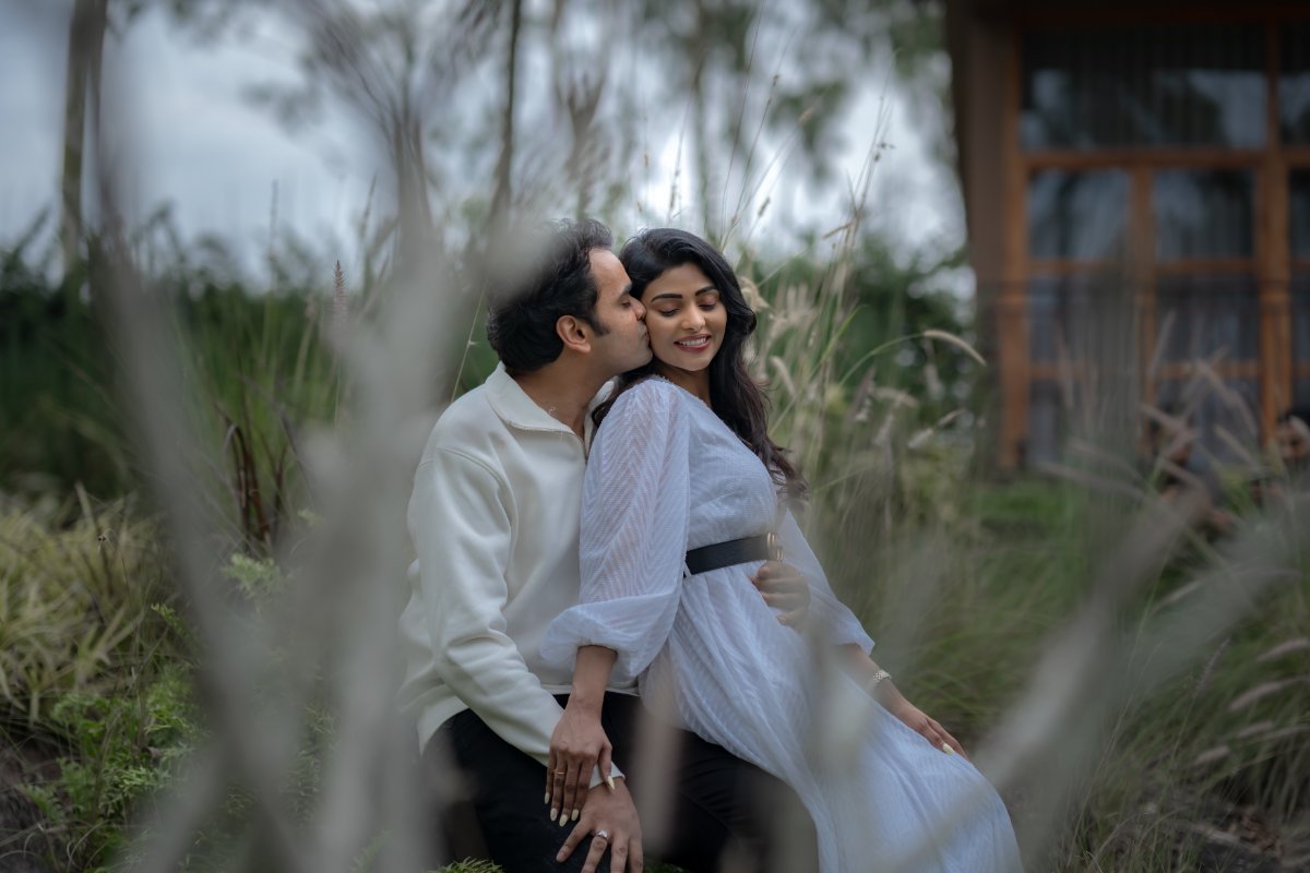 Pre-wedding couple shoot by WeddingClickz — close, unposed, shallow focus